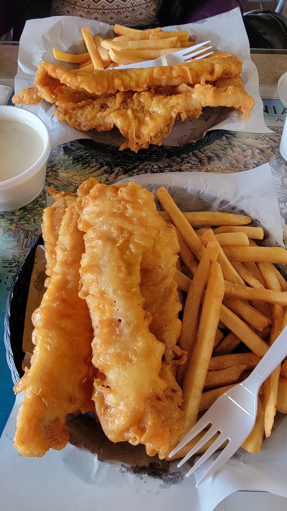 Printed menu for fish, oysters, and chips.