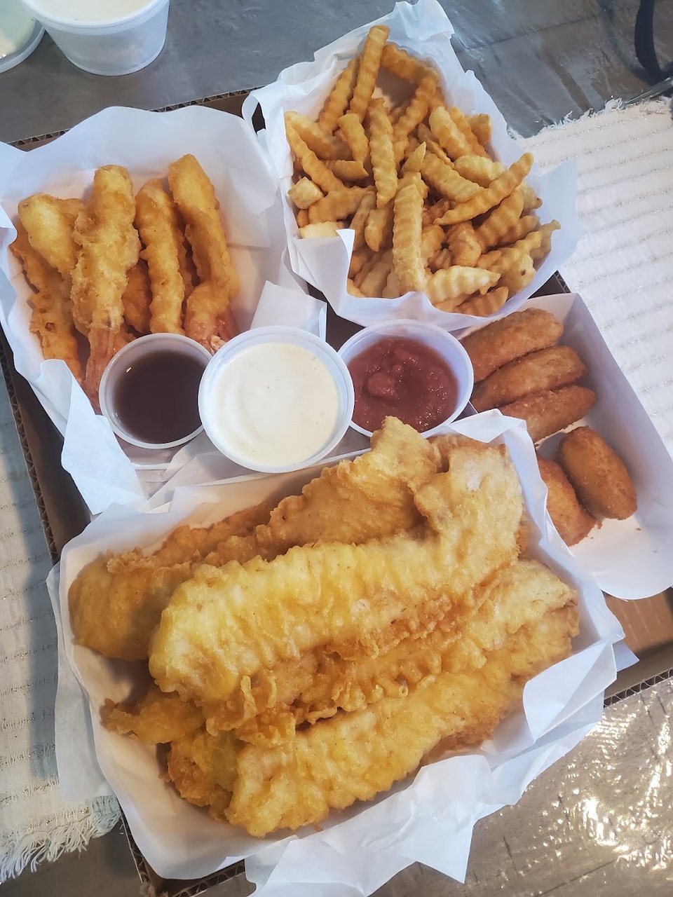Menu page showing clam strips, calamari, and shrimp.
