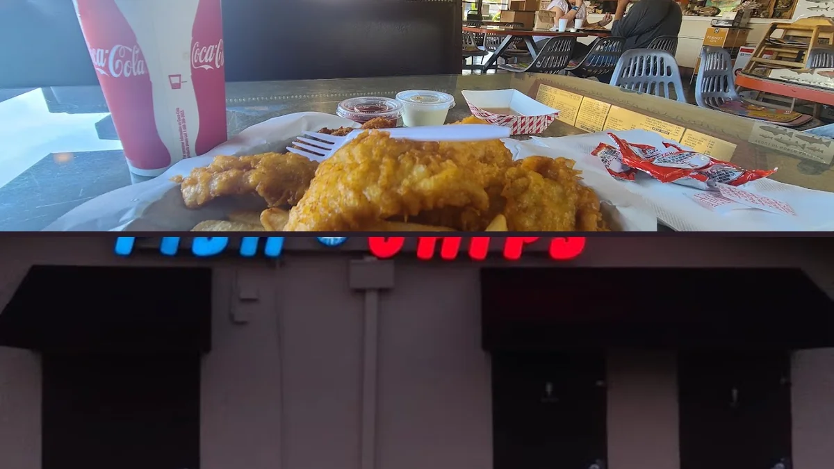 Golden fish and chips on a paper-lined tray.